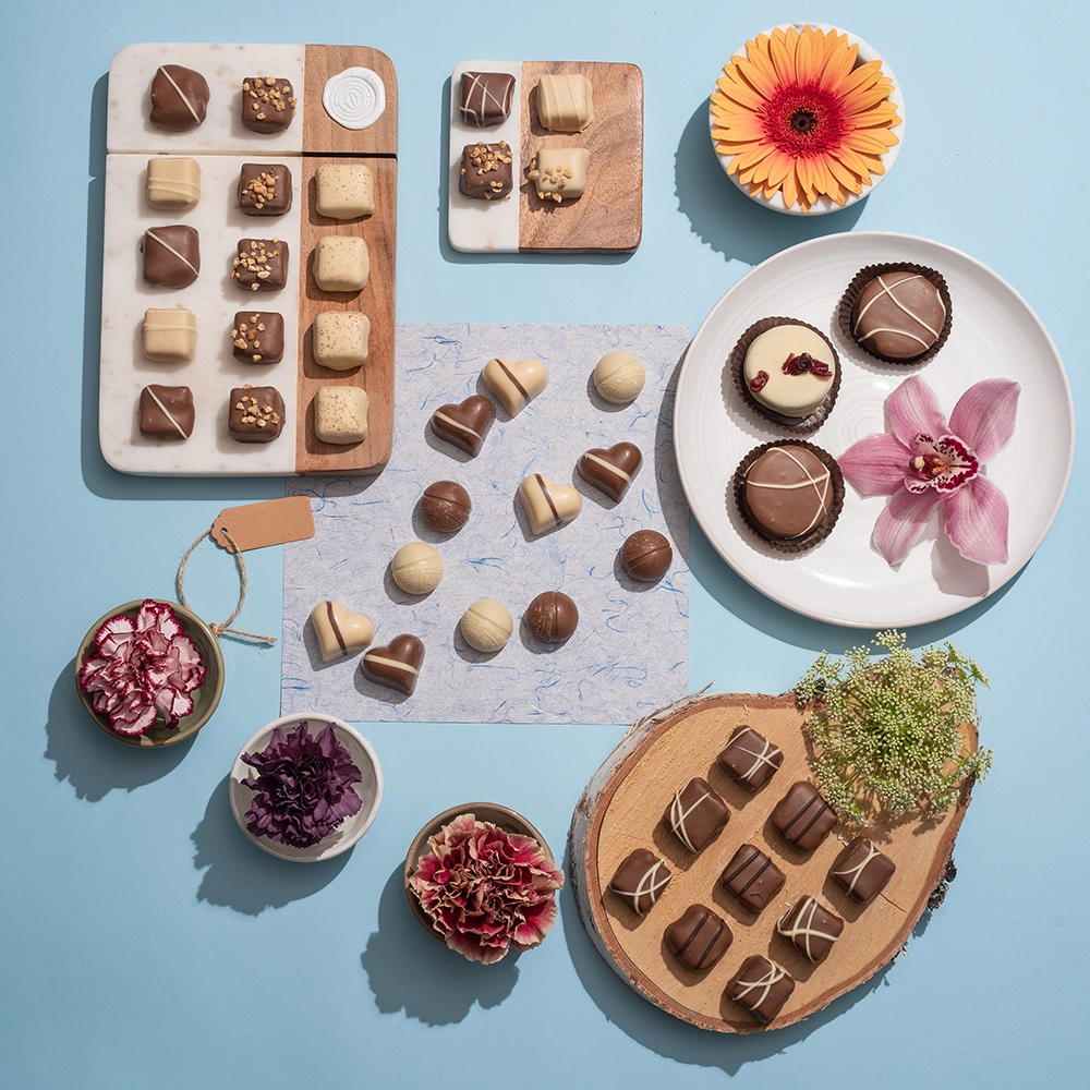 Fotobewerking van een flat-lay foto van chocoladetruffels.