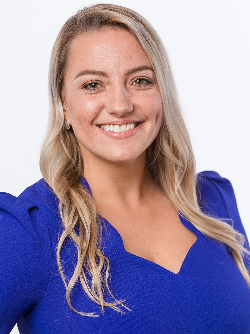 Vibrant lifestyle headshot retouching services for women.