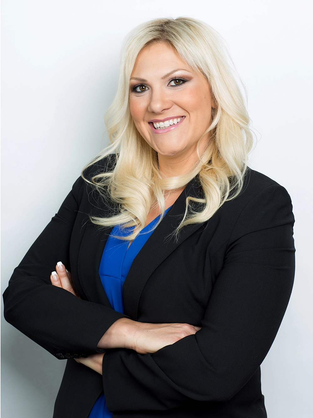 Business casual female headshot retouching services.